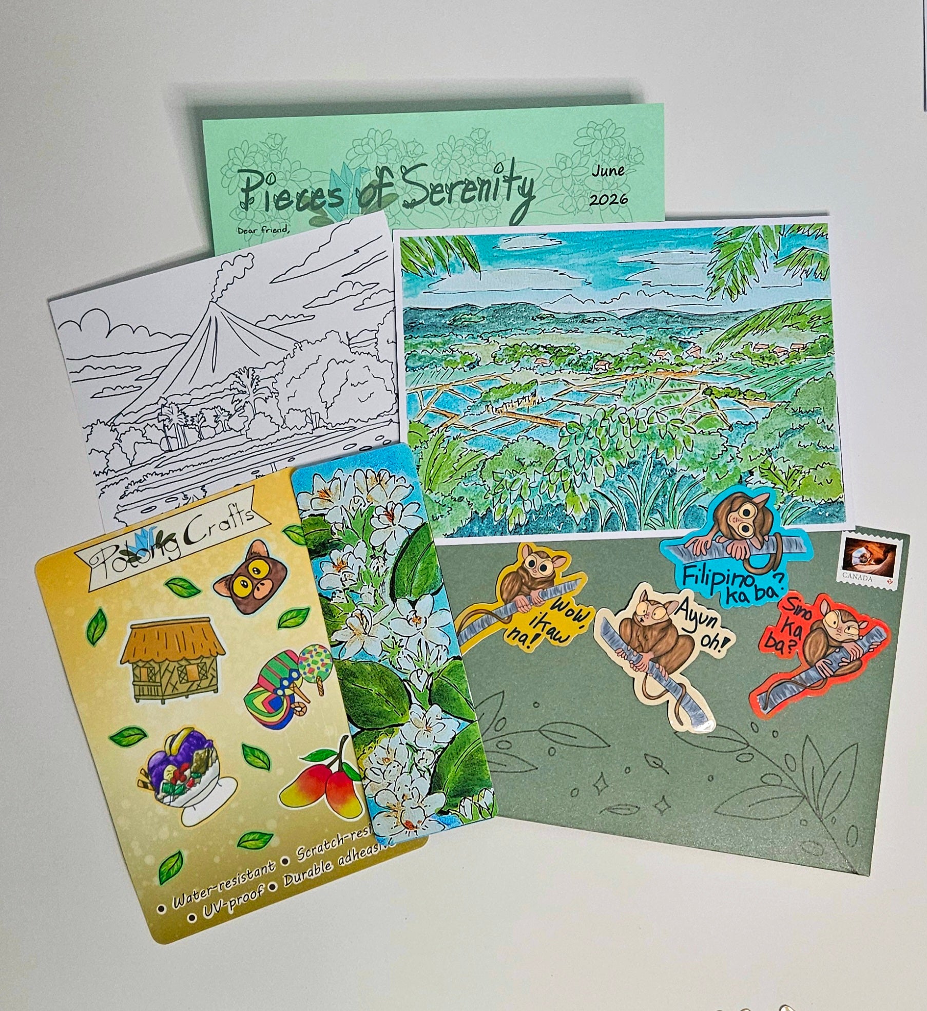 Collection of illustrated cards with nature scenes and cartoon characters on a white background
