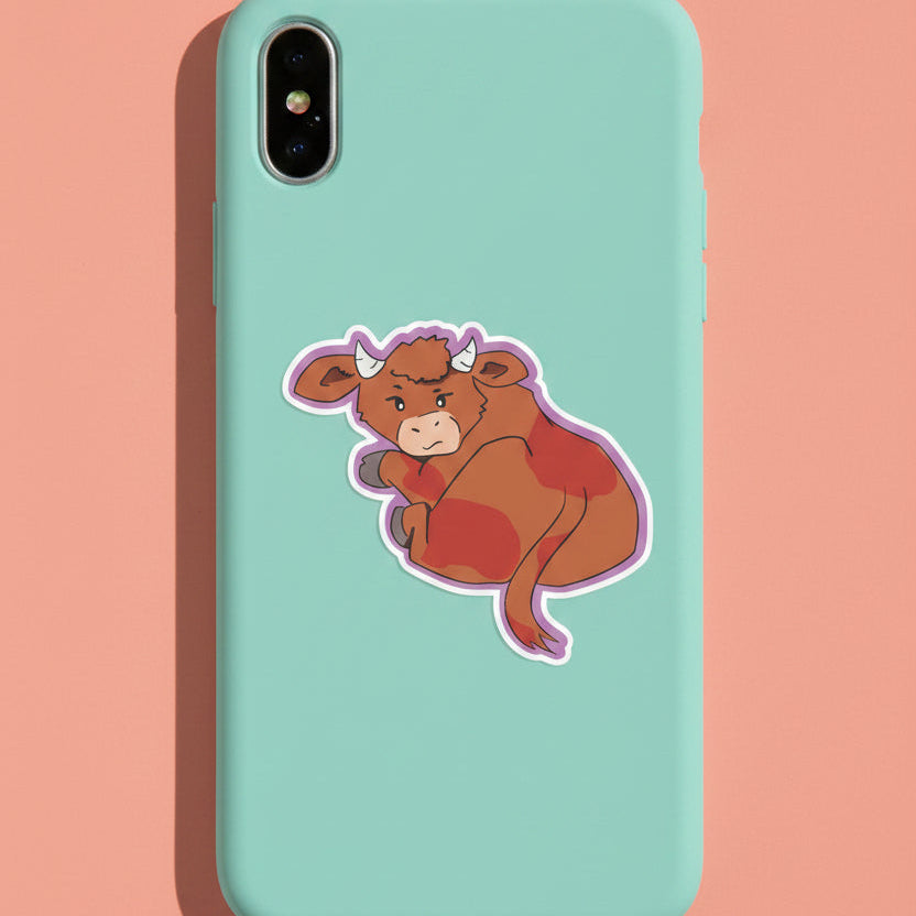 Cartoon bull sticker on a light blue phone case with a pink background 