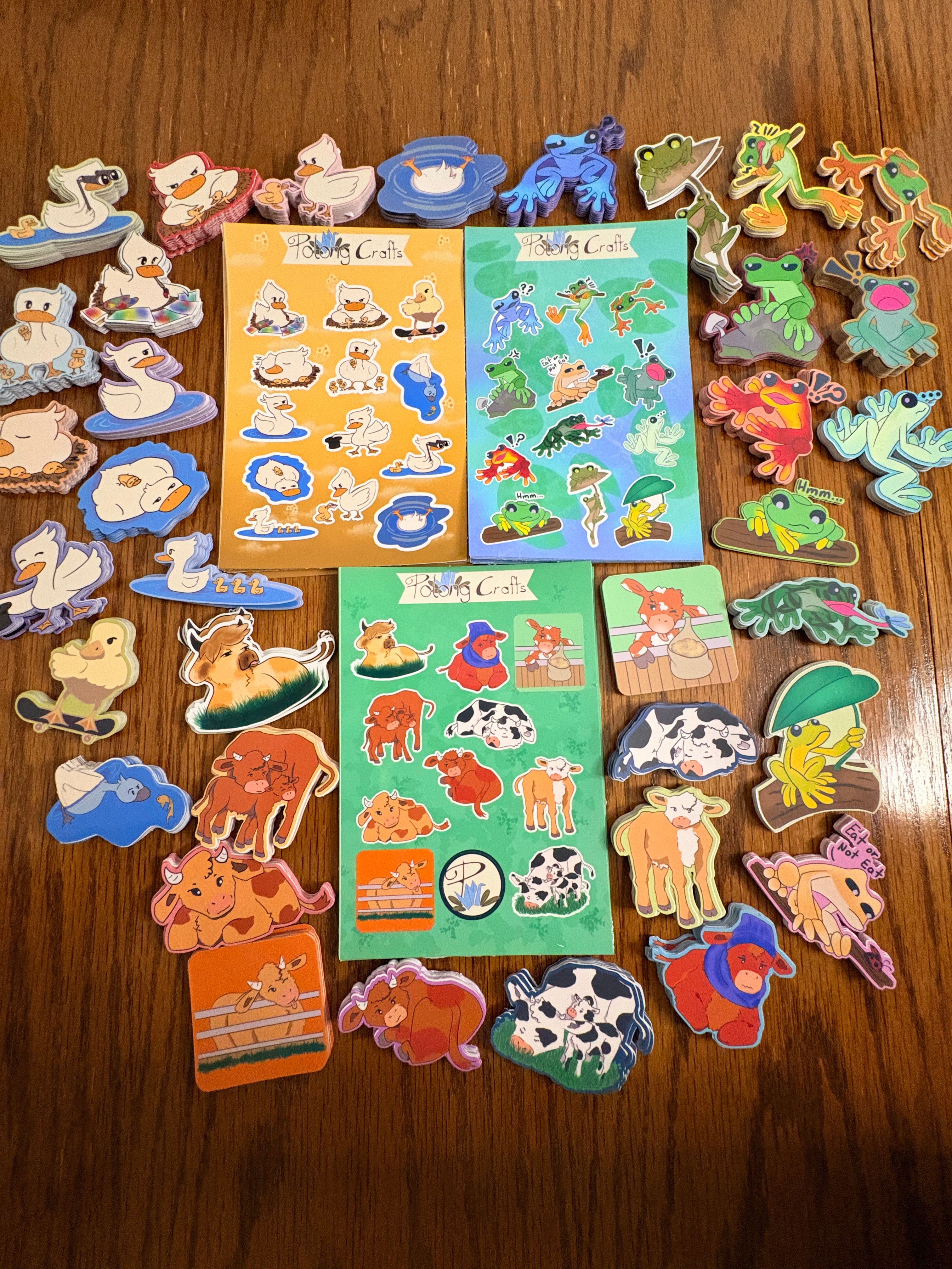 Collection of colorful animal-themed wooden toys on a wooden surface