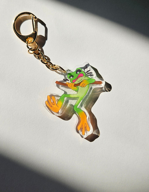 Keychain with a frog design on a white background