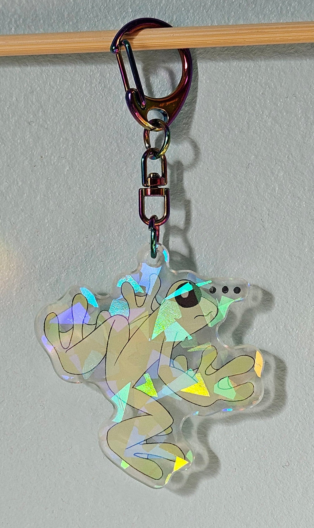 Keychain with cartoon character on a light gray background