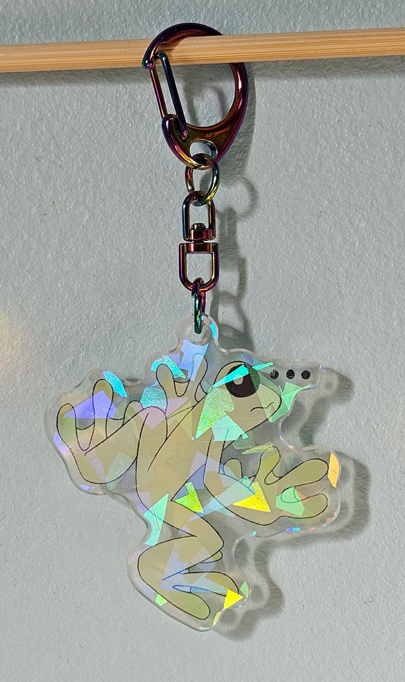 Keychain with cartoon character on a light gray background